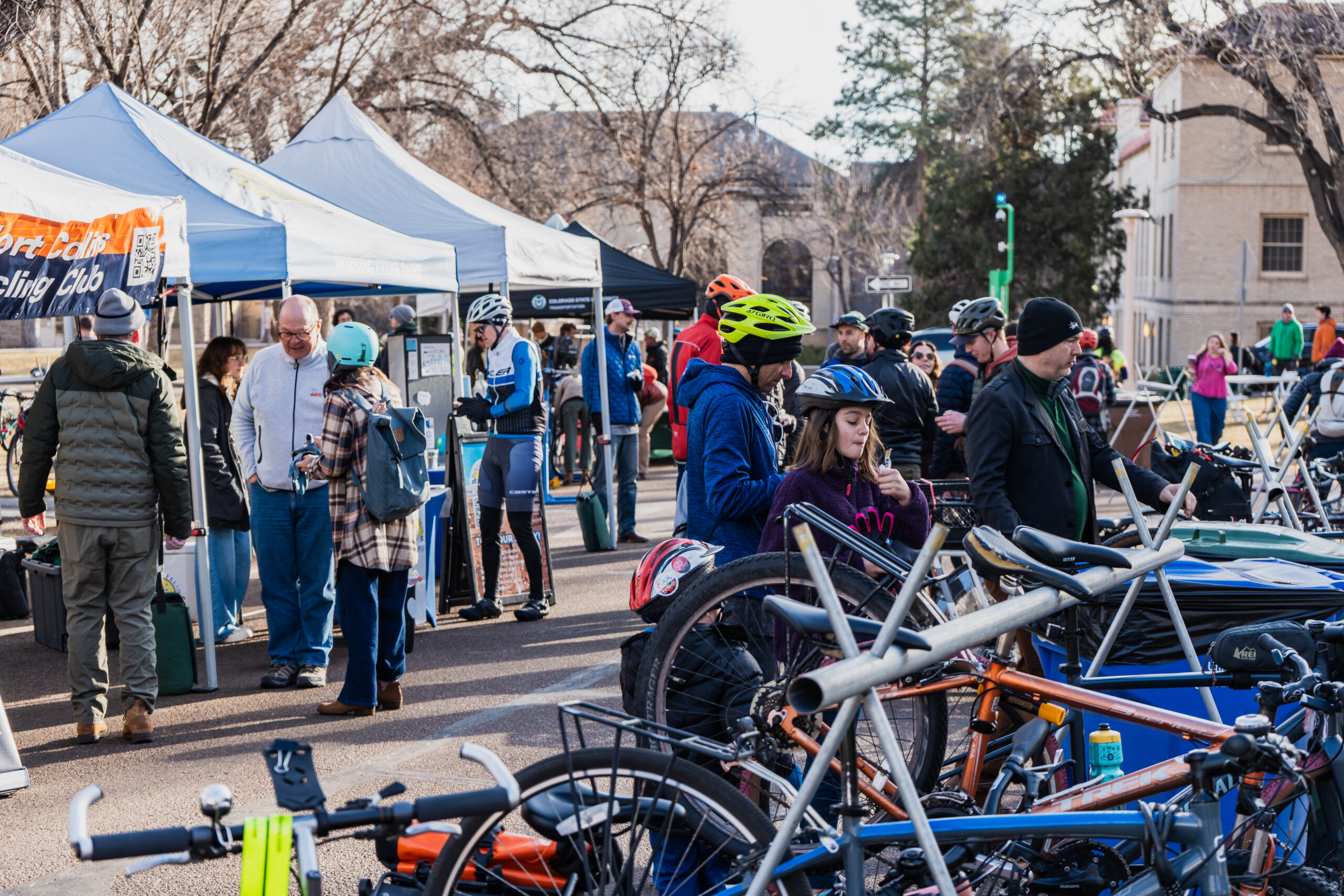 People enjoy the tents and vendors at Winter Bike to Work Day.