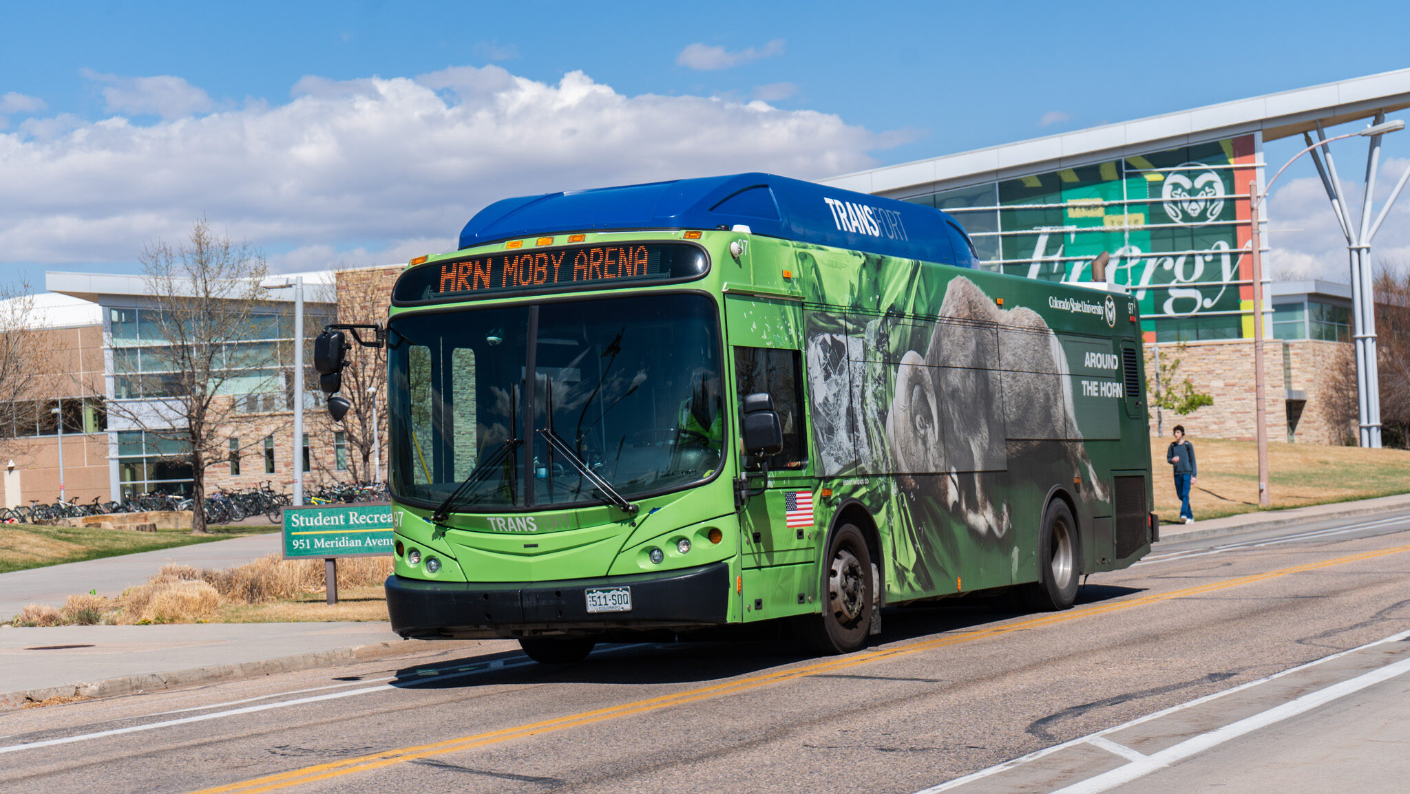 Transfort bus driving by the CSU Recreational center
